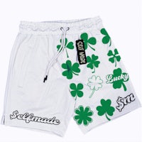 a white shorts with shamrocks and shamrocks on it