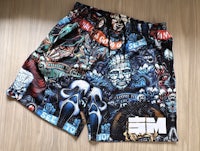 a pair of shorts with an image of monsters on them